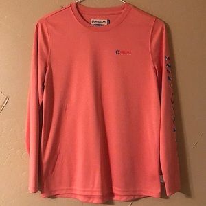 slick pink Magellan shirt.